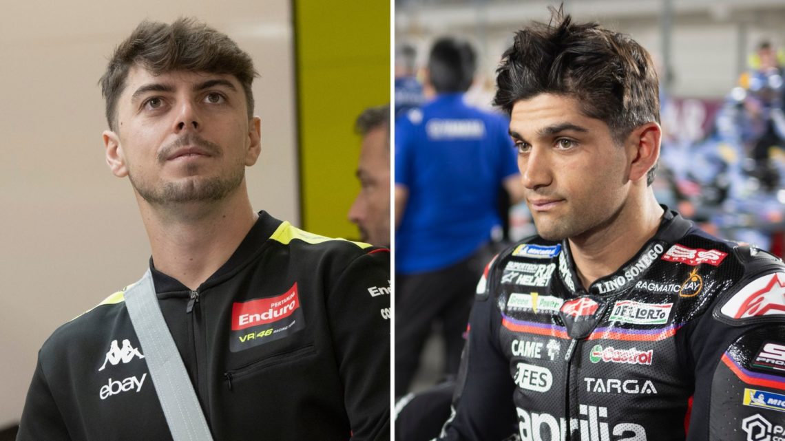 Fabio Di Giannantonio of Italy and Pertamina Enduro VR46 Racing Team looks on in team garage, and Jorge Martin of Spain and Aprilia Racing prepares...