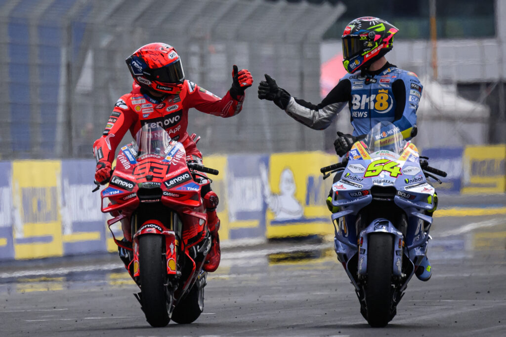 Ducati rider Marc Marquez and Fermin Aldeguer of Gresini celebrate after the Le Mans Sprint at the 2025 MotoGP French Grand Prix