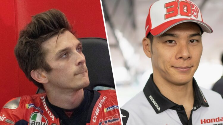 Honda rider Luca Marini in the garage at the 2025 MotoGP British Grand Prix and test rider Takaaki Nakagami