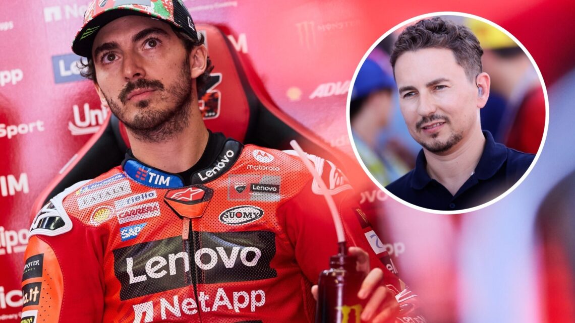 Ducati rider Francesco Bagnaia in the garage during practice for the 2025 MotoGP Italian Grand Prix at Mugello with an inset of Jorge Lorenzo at Ar...