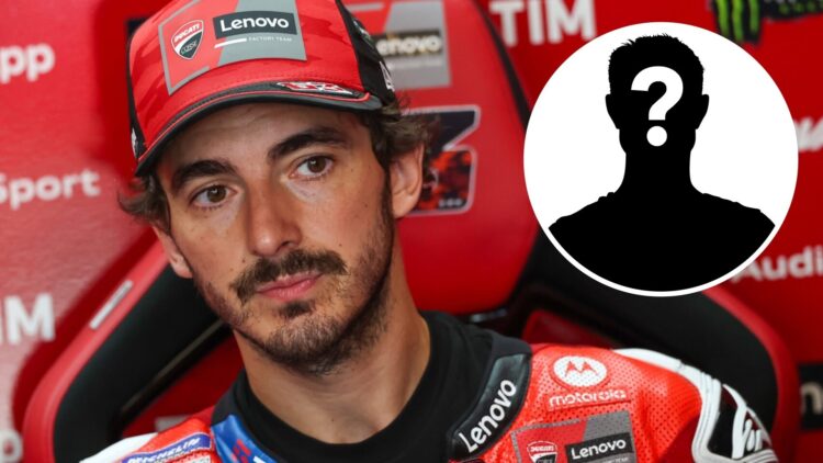 Ducati rider Francesco Bagnaia sits in the garage at the 2025 MotoGP Czech Grand Prix with a mystery person inset