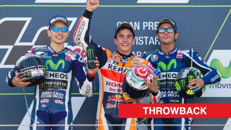 Honda rider Marc Marquez celebrates winning the 2016 Aragon Grand Prix with Yamaha's Jorge Lorenzo and Valentino Rossi