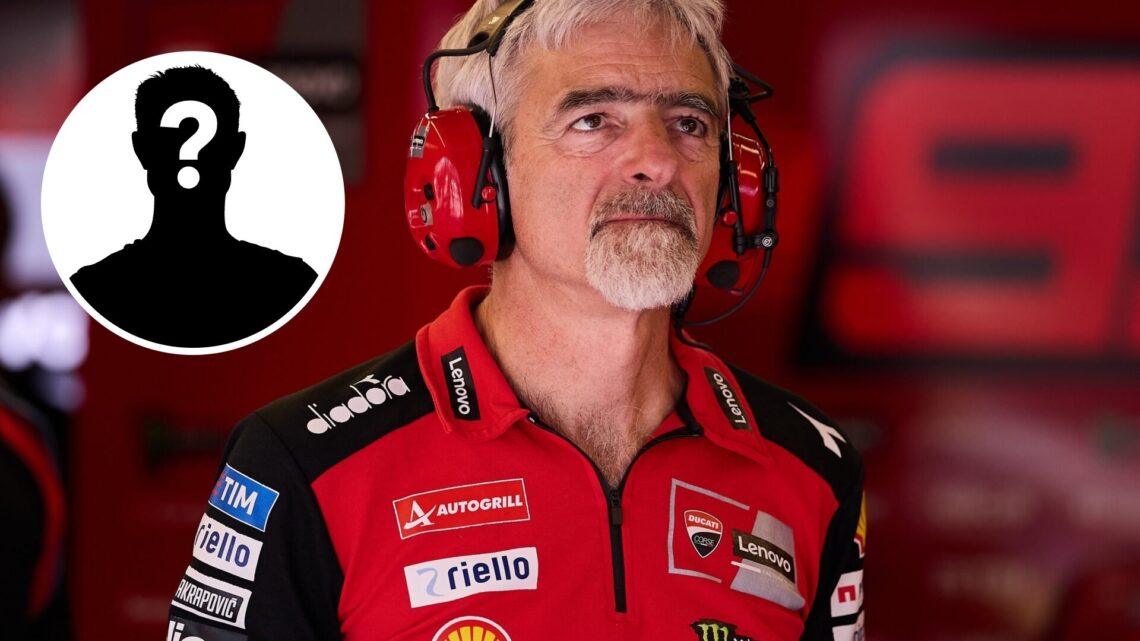 Luigi Dall'Igna of Ducati at the 2025 Italian Grand Prix with a mystery overlay image
