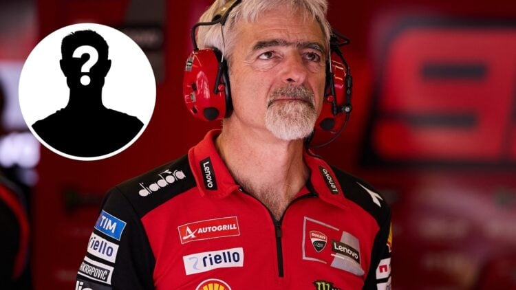 Luigi Dall'Igna of Ducati at the 2025 Italian Grand Prix with a mystery overlay image