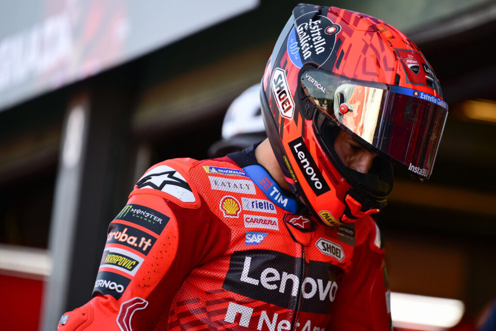 Marc Marquez arrives to his Ducati garage during qualifying at the 2025 San Marino Grand Prix