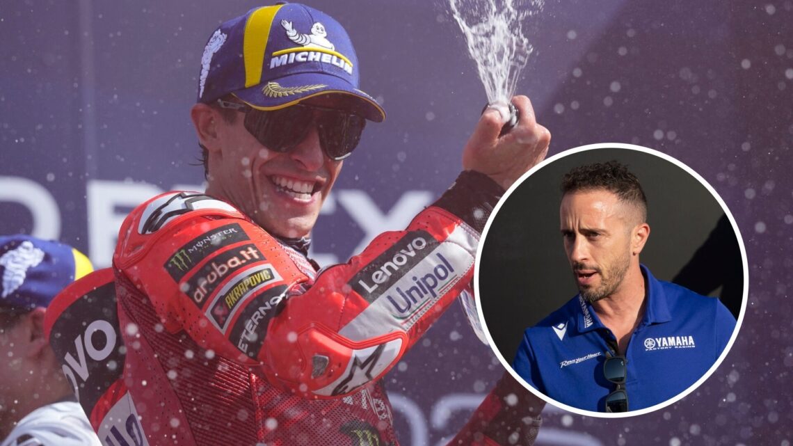 Ducati rider Marc Marquez celebrates winning the 2025 MotoGP San Marino Grand Prix with an inset of Yamaha test rider Andrea Dovizioso speaks to th...