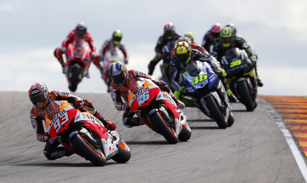 Honda's Marc Marquez leads Dani Pedrosa and Yamaha's Valentino Rossi in the 2013 MotoGP Aragon Grand Prix