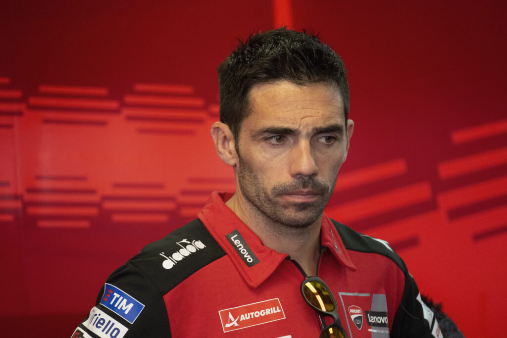 Michele Pirro stands in the Ducati MotoGP garage at the Italian Grand Prix