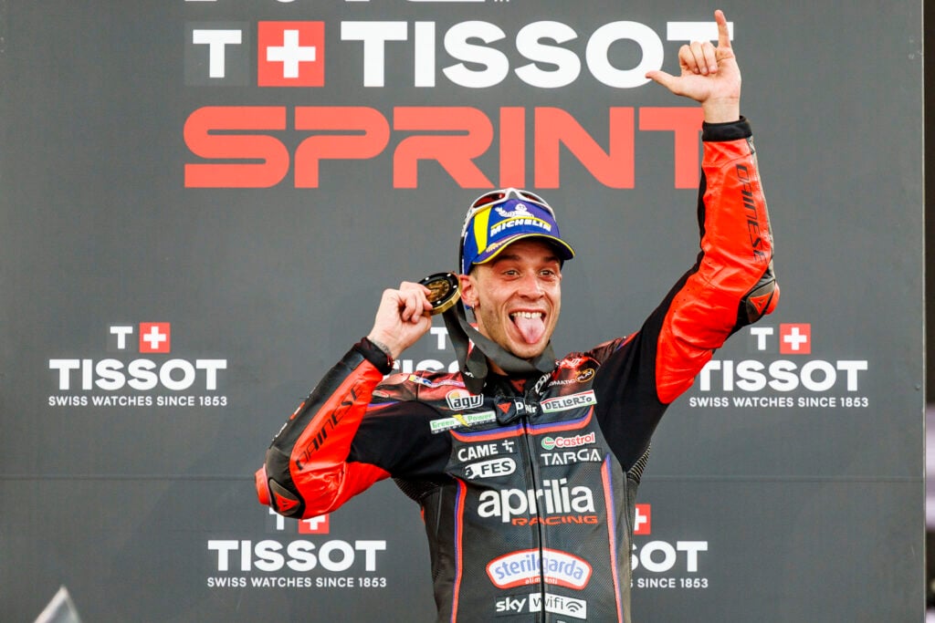 Marco Bezzecchi of Aprilia sticks his tongue out in celebration after winning the Indonesian Grand Prix