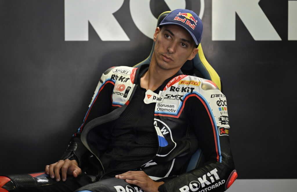 BMW World Superbike rider Toprak Razgatlioglu looks on from the garage during practice at the 2025 Estoril round