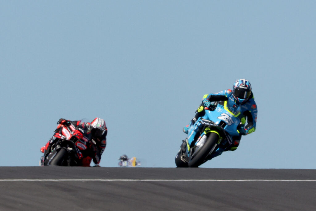 Trackhouse rider Raul Fernandez leads the Phillip Island Sprint Race ahead of Aprilia's Marco Bezzecchi at the 2025 MotoGP Australian Grand Prix