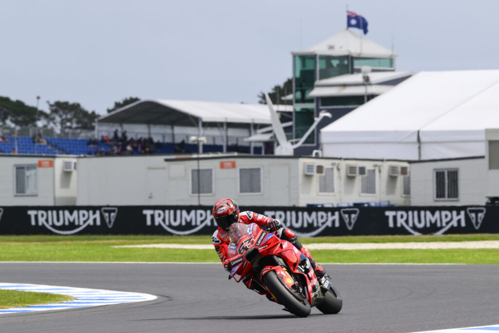 Francesco Bagnaia taking a corner on his Ducati bike during practice at the 2025 Australian Grand Prix.