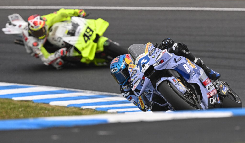 Gresini rider Alex Marquez leads VR46's Fabio Di Giannantonio on track at Phillip Island during the 2025 MotoGP Australian Grand Prix