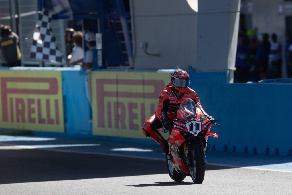 Ducati World Superbike rider Nicolo Bulega takes the chequered flag to win Race 2 at the 2025 Jerez round