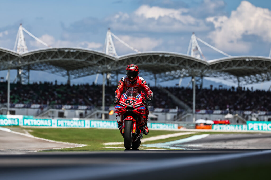 Ducati rider Francesco Bagnaia rides onto the Sepang grid before the 2025 MotoGP Malaysian Grand Prix