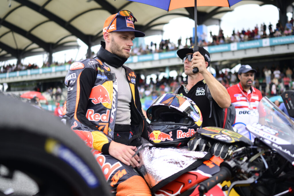 KTM rider Brad Binder preparing for the Sprint race at the Malaysian Grand Prix atop his bike on the grid.