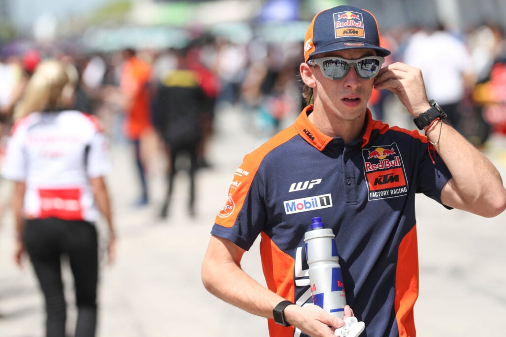 Pedro Acosta of KTM walks through the pit lane at the 2025 Malaysian Grand Prix