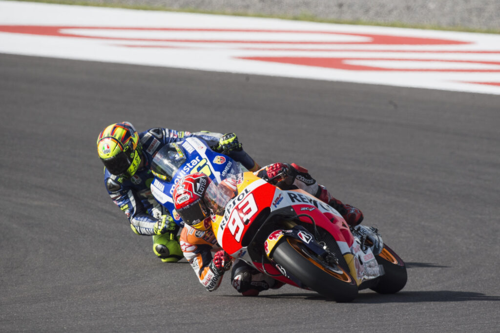 Honda's Marc Marquez leads Yamaha's Valentino Rossi in the 2015 MotoGP Argentina Grand Prix