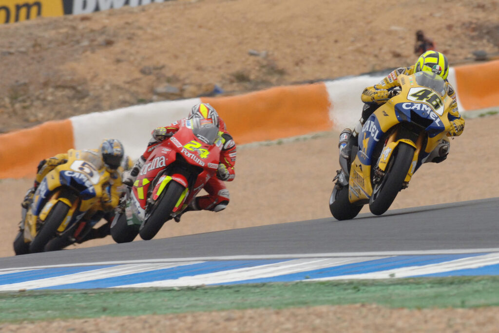 Yamaha rider Valentino Rossi leads Gresini Honda rival Toni Elias on track during the 2006 MotoGP Portuguese Grand prix at Estoril