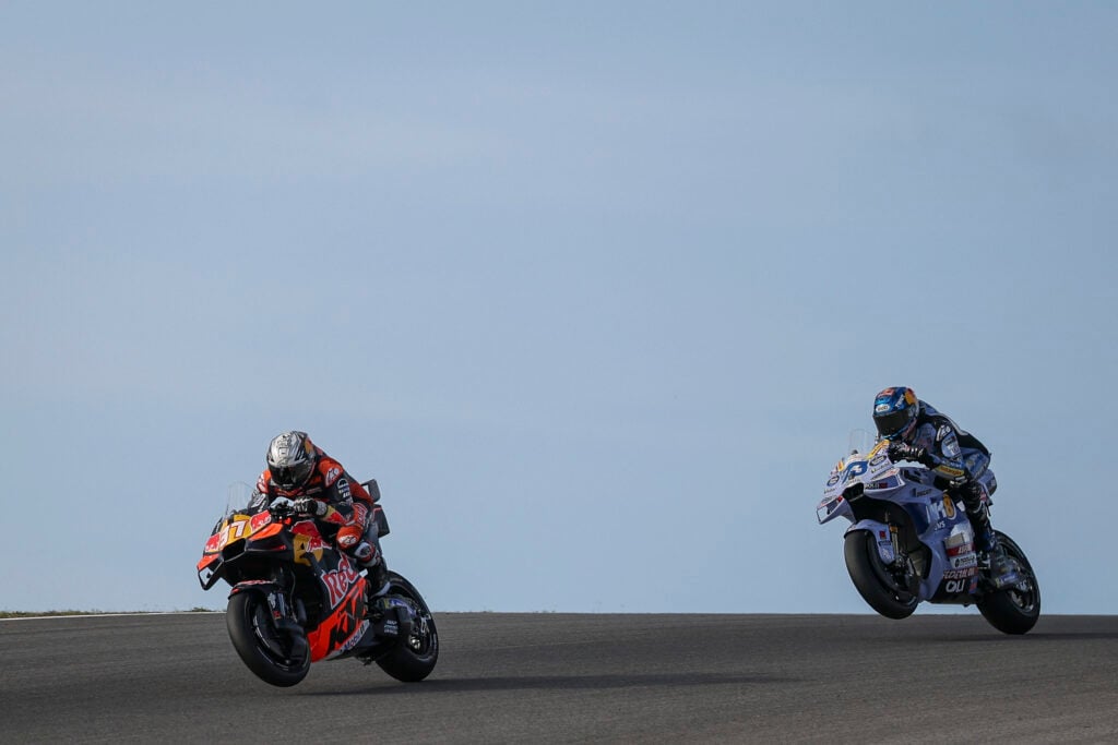 KTM rider Pedro Acosta leads Gresini's Alex Marquez on track during the Portimao Sprint Race at the 2025 MotoGP Portuguese Grand Prix