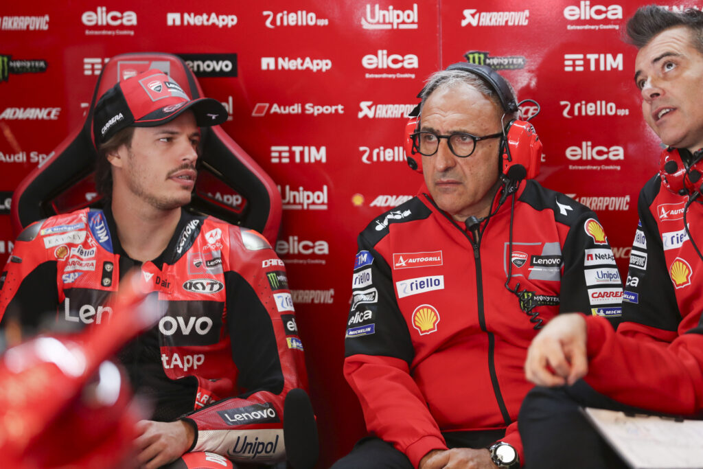 Nicolo Bulega speaking to Ducati staff ahead of qualifying for the 2025 Portuguese Grand Prix.