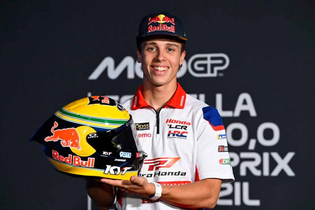 Diogo Moreira of LCR poses with his helmet at the 2026 Brazilian Grand Prix
