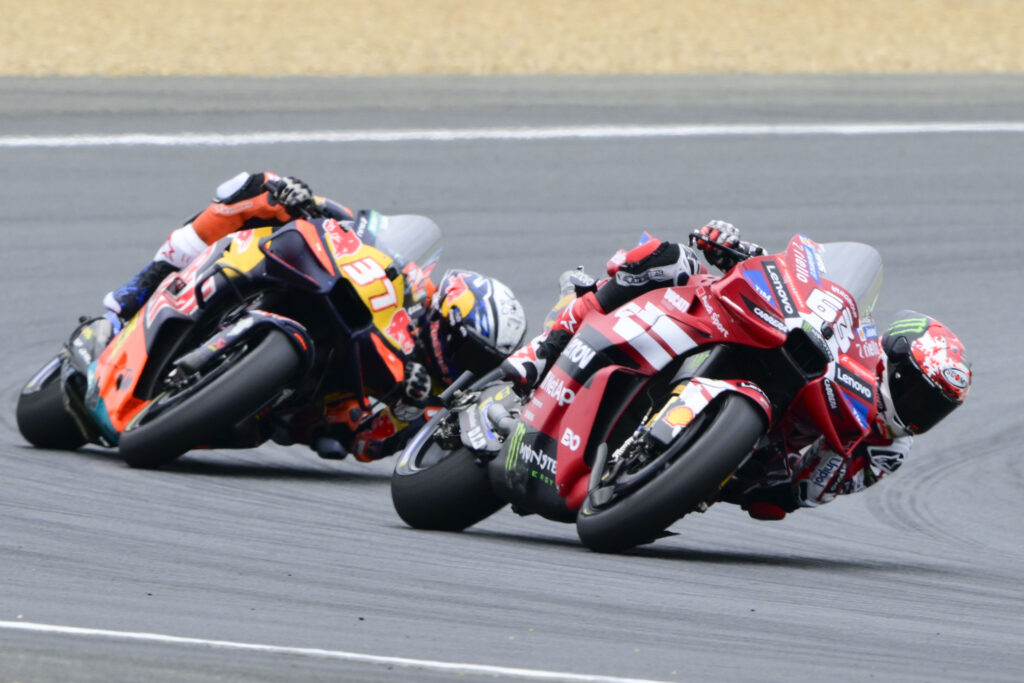 Ducati rider Francesco Bagnaia leads KTM's Pedro Acosta on track during the 2026 MotoGP French Grand Prix