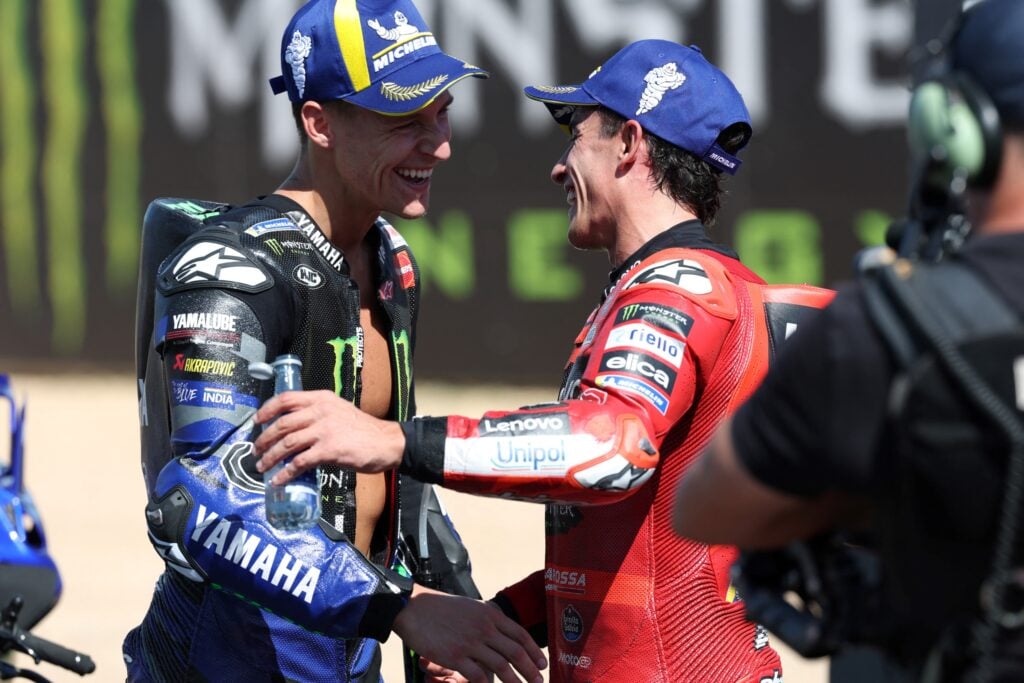 Yamaha rider Fabio Quatararo and Ducati rider Marc Marquez hug after the Catalan Grand Prix.
