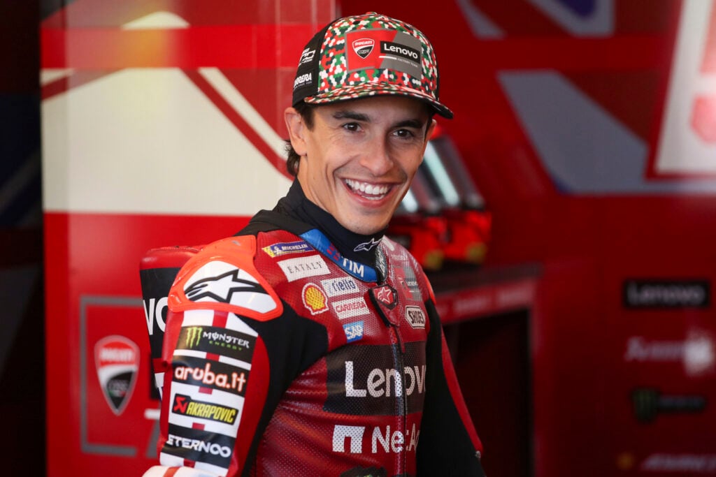 Marc Marquez smiles in the Ducati garage at the 2026 Italian Grand Prix.