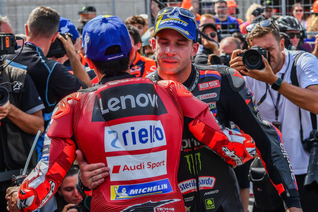 KTM rider Pedro Acosta embraces Ducati rider Marc Marquez after the Hungarian Grand Prix.