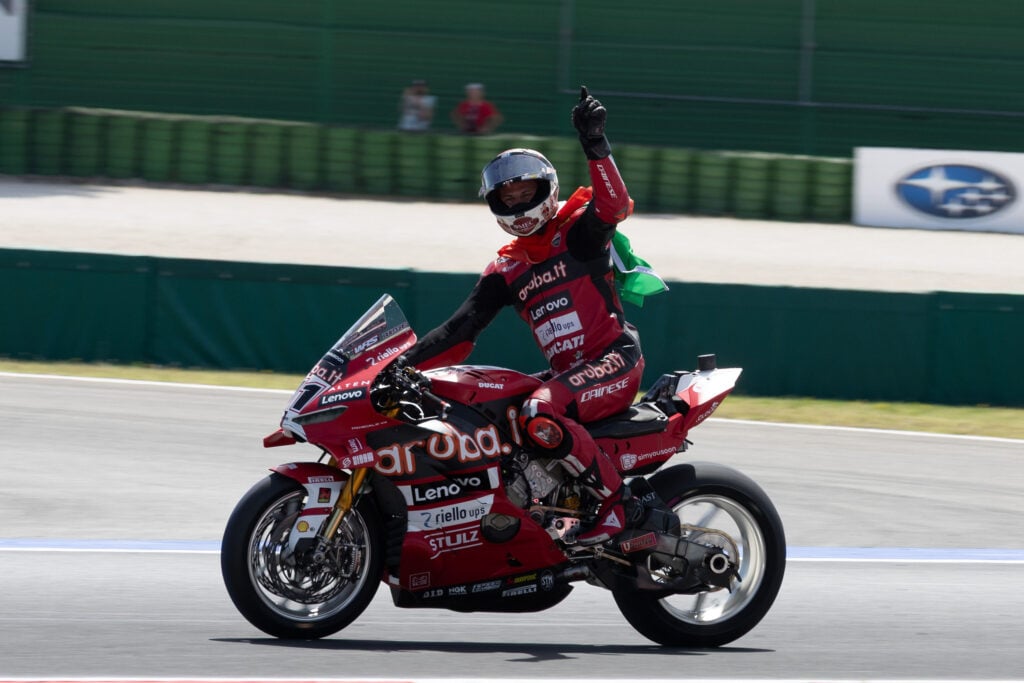 Ducati's Nicolo Bulega celebrates after winning the Superpole race at Misano in the 2026 World Superbike race.