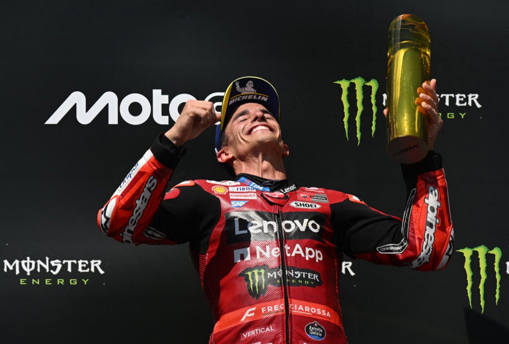 Marc Marquez of Ducati celebrates on the Czech Grand Prix podium