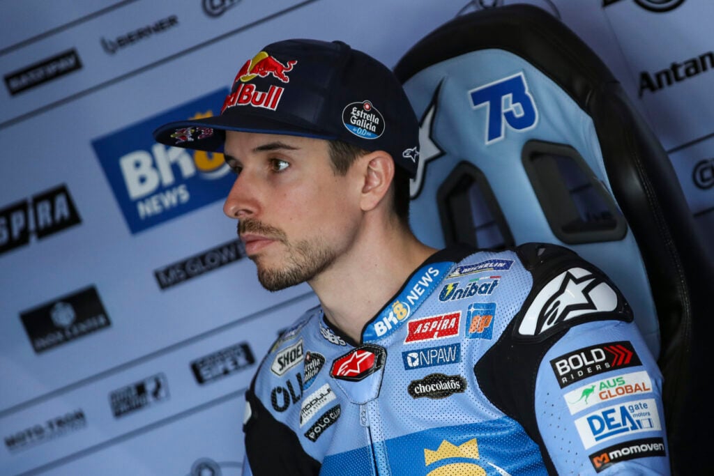 Alex Marquez looks on from the Gresini garage during practice for the 2026 MotoGP Czech Grand Prix after suffering a back injury.