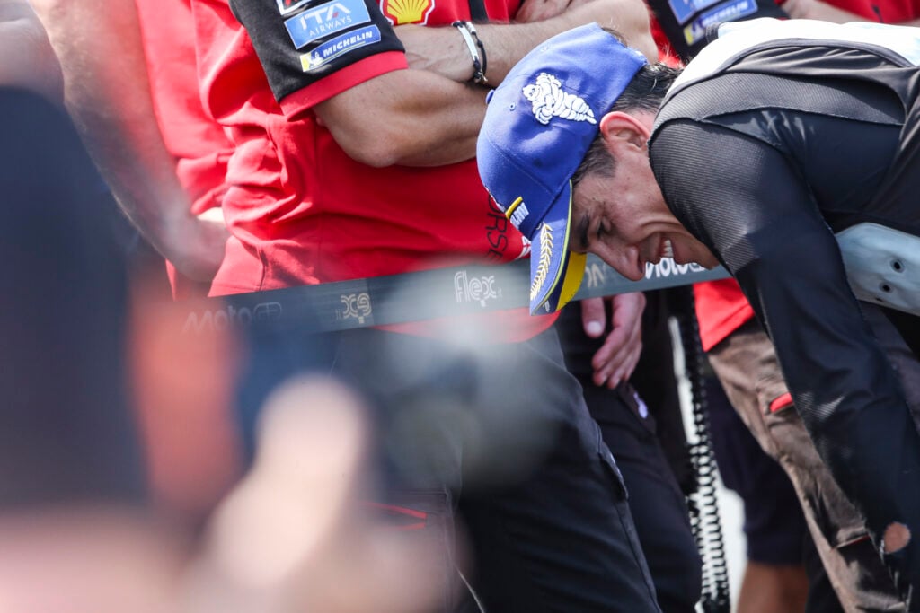 Ducati rider Marc Marquez signs at Parc Ferme after the sprint race at the 2026 MotoGP Czech Grand Prix in Brno.