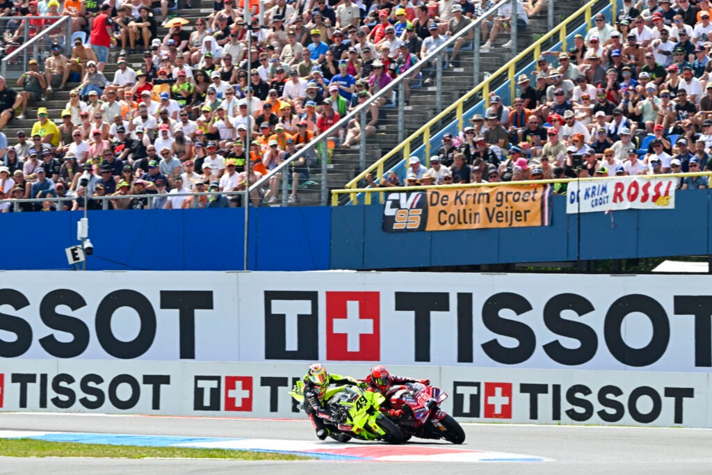 Ducati's Marc Marquez and VR46's Fabio Di Gianntonio battle during the Dutch Grand Prix.