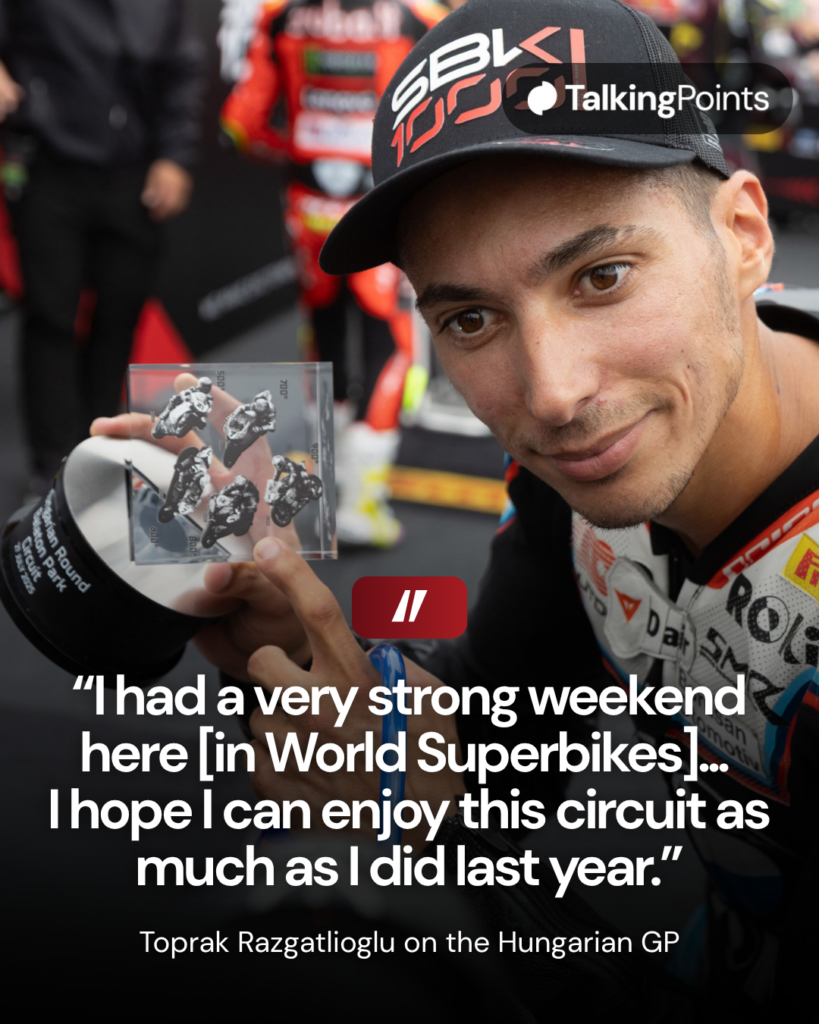 Torak Razgatlioglu celebrates with a trophy after winning the 2025 World Superbike Superpole race at Balaton Park.