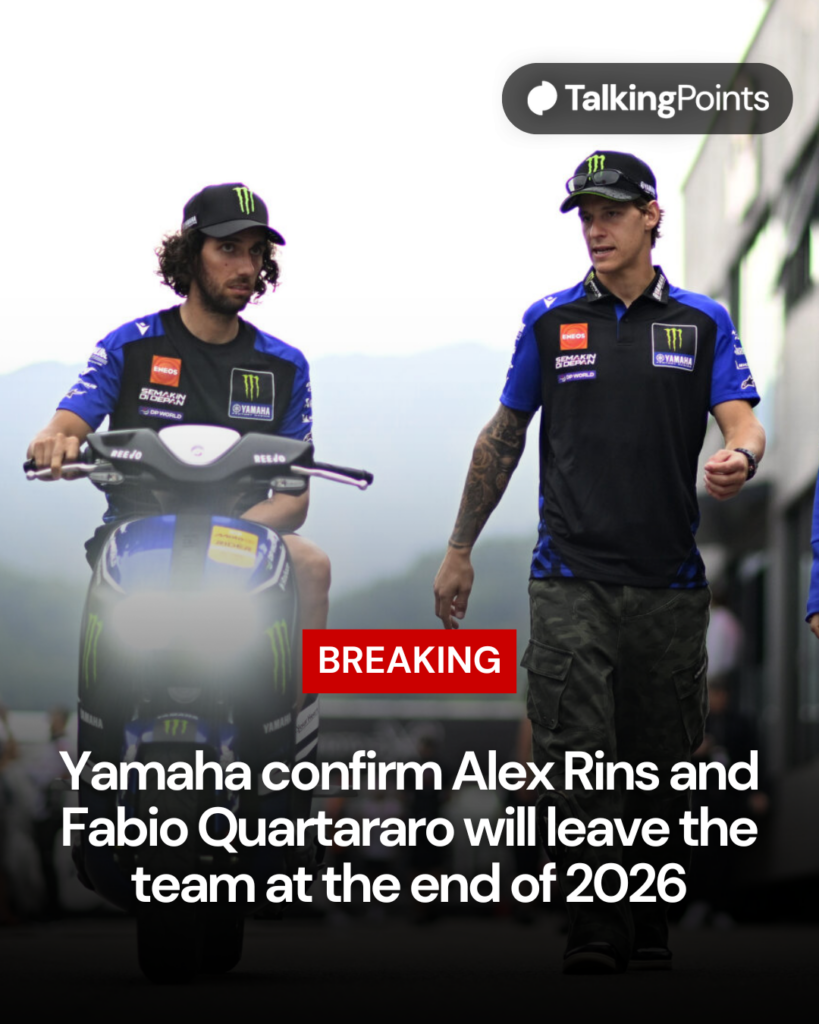 Yamaha's Alex Rins rides a scooter in the 2026 Italian Grand Prix paddock with Fabio Quattararo walking beside him.
