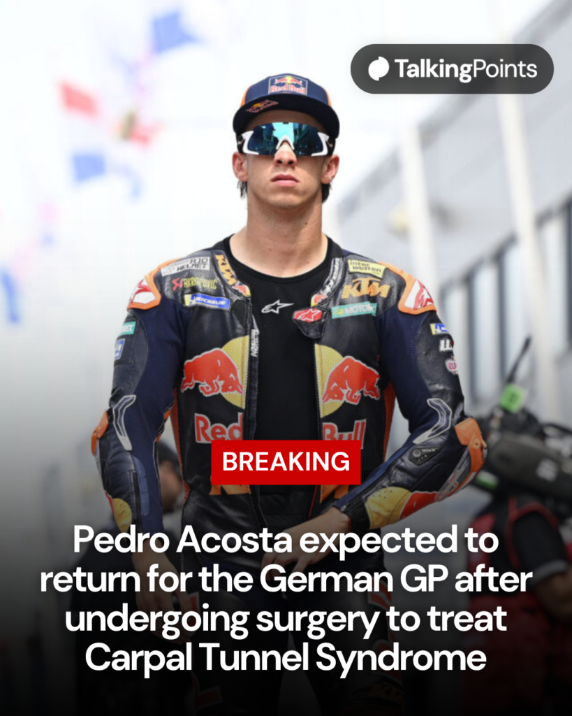 Pedro Acosta walking through the MotoGP paddock in his KTM overalls at the 2026 Dutch Grand Prix.