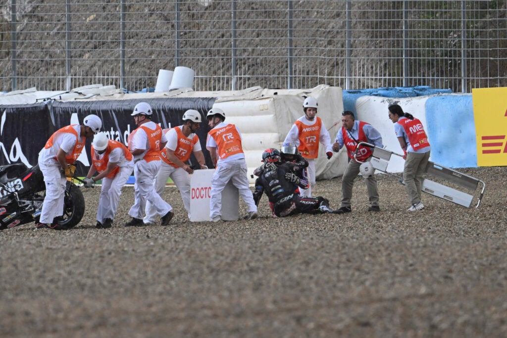 Pramac's Toprak Razgatlioglu apologises to Aprilia test rider Lorenzo Savadori after crashing in the Sprint Race at the 2026 MotoGP Spanish Grand Prix
