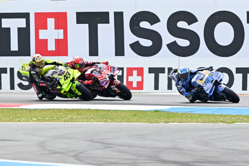 Marc Marquez of Ducati tries to battle against Fabio Di Giannantonio of VR46 and Fermin Aldeguer of Ducati Gresini during the Dutch Grand Prix.