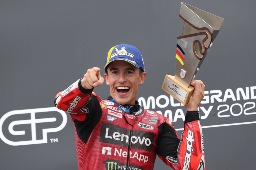 Marc Marquez of Ducati celebrates on the podium at the 2026 German Grand Prix