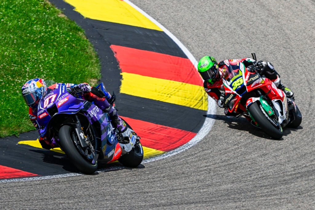 Pramac Yamaha rider Toprak Razgatlioglu leads LCR Honda stand-in Cal Crutchlow on track during the 2026 MotoGP German Grand Prix