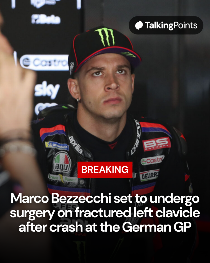 Marco Bezzecchi sitting in his Aprilia box during practice at the 2026 German Grand Prix.